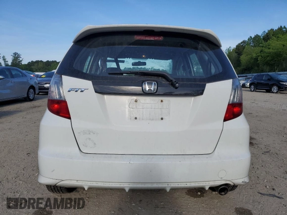 2010 Honda Fit Sport with VIN JHMGE8H49AC038461, listed as a Copart auction lot 54330355 with 133,428 mi miles and Salvage title. Bid and sale history available at DreamBid. Image 6.