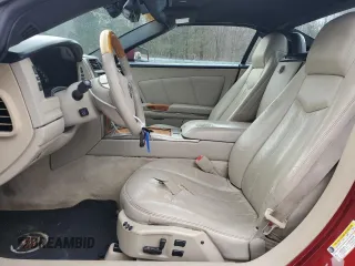 2006 Cadillac XLR z VIN 1G6YV36A465601383, wystawiony jako Copart lot #47580635 z przebiegiem 145 432 mil mil oraz Szkody całkowita. Historia ofert i sprzedaży dostępna na DreamBid. Obrazek 7.