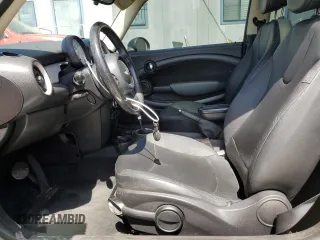 2013 MINI Hardtop with VIN WMWSU3C52DT680782, listed as a Copart auction lot 61779515 with 94,378 mi miles and Salvage title. Bid and sale history available at DreamBid. Image 7.