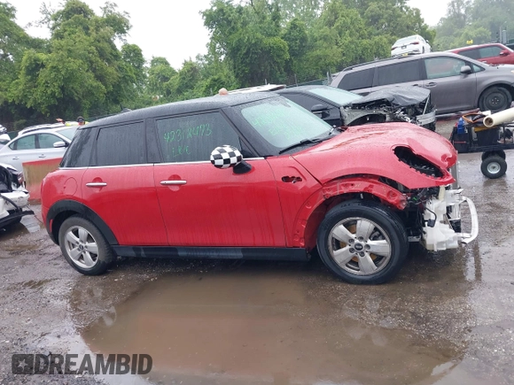 2017 MINI Hardtop 4 Door Cooper with VIN WMWXU1C58H2E18094, listed as a IAAI auction lot 42312473 with 50,482 mi miles and . Bid and sale history available at DreamBid. Image 14.