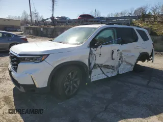 2023 Honda Pilot Elite z VIN 5FNYG1H87PB022071, wystawiony jako Copart lot #51777995 z przebiegiem 18 369 mil mil oraz Szkoda całkowita • Salvage title. Historia ofert i sprzedaży dostępna na DreamBid. Obrazek 1.
