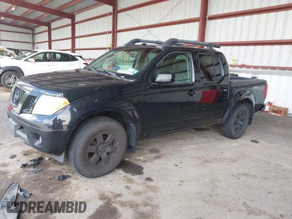 2011 Nissan Frontier Pro-4X with VIN 1N6AD0EV6BC437545, listed as a IAAI auction lot 42633761 with 181,753 mi miles and . Bid and sale history available at DreamBid. Image 2.