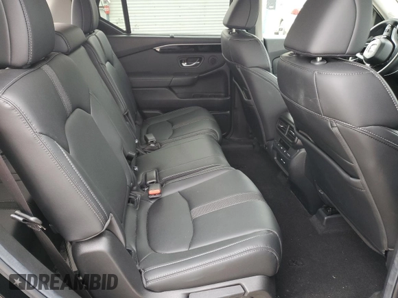 2025 Honda Pilot EX-L z VIN 5FNYG1H40SB015128, wystawiony jako Copart lot #48028125 z przebiegiem Nie podano mil oraz Szkoda całkowita • Salvage title. Historia ofert i sprzedaży dostępna na DreamBid. Obrazek 11.