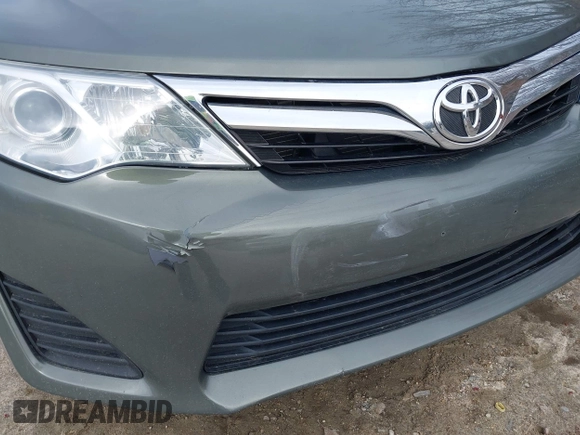 2012 Toyota Camry L with VIN 4T1BF1FK3CU619416, listed as a IAAI auction lot 42020573 with 74,325 mi miles and . Bid and sale history available at carsss.com. Image 19.