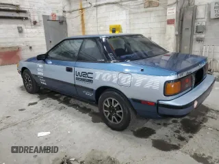 1987 Toyota Celica with VIN JT2ST67C3H7085589, listed as a Copart auction lot 44126585 with 81,830 mi miles and Salvage title. Bid and sale history available at DreamBid. Image 2.