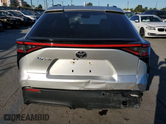2023 Toyota bZ4X XLE with VIN JTMAAAAA8PA015784, listed as a Copart auction lot 56072755 with 21,387 mi miles and Salvage Title. Bid and sale history available at DreamBid. Image 6.