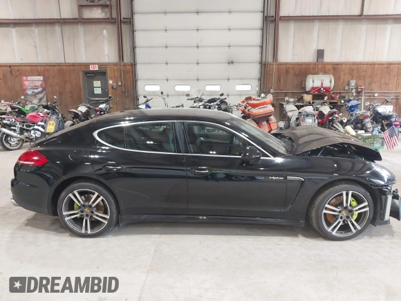 2016 Porsche Panamera S E-Hybrid z VIN WP0AD2A74GL040039, wystawiony jako IAAI lot #42411042 z przebiegiem 60 616 mil mil oraz . Historia ofert i sprzedaży dostępna na DreamBid. Obrazek 14.