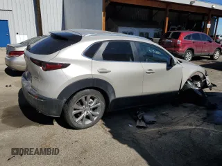 2023 Mazda CX-30 S Select with VIN 3MVDMBBM8PM571503, listed as a Copart auction lot 46948105 with 12,260 mi miles and Salvage Title. Bid and sale history available at DreamBid. Image 3.