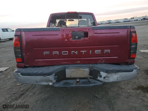 2002 Nissan Frontier 2WD XE with VIN 1N6DD26S02C393409, listed as a Copart auction lot 86197564 with 256,409 mi miles and Salvage Title. Bid and sale history available at carsss.com. Image 6.