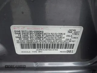 2007 Mitsubishi Outlander ES z VIN JA4MS31X07Z015784, wystawiony jako IAAI lot #38911508 z przebiegiem 166 115 mil mil oraz . Historia ofert i sprzedaży dostępna na DreamBid. Obrazek 9.