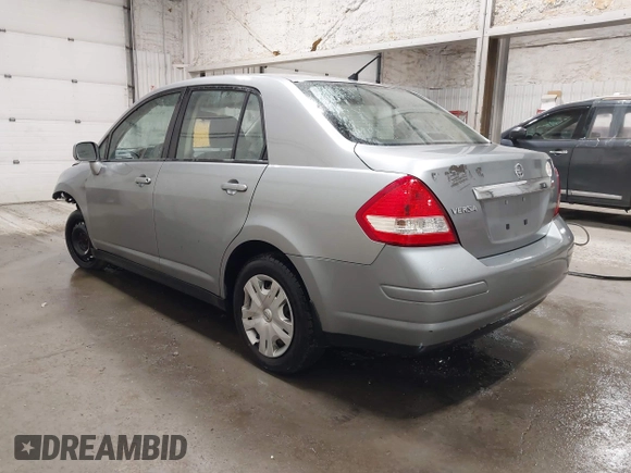 2011 Nissan Versa S with VIN 3N1BC1AP9BL485989, listed as a IAAI auction lot 42414692 with 122,213 mi miles and . Bid and sale history available at DreamBid. Image 3.