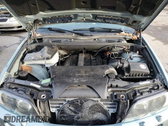 2003 BMW X5 3.0i with VIN 5UXFA53573LV74706, listed as a Copart auction lot 82641044 with 141,589 mi miles and Salvage Title. Bid and sale history available at carsss.com. Image 12.