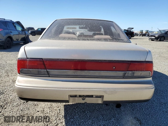 1992 Nissan Maxima z VIN JN1HJ01P6NT623546, wystawiony jako Copart lot #78095314 z przebiegiem 104 718 mil mil oraz Szkoda całkowita • Salvage title. Historia ofert i sprzedaży dostępna na DreamBid. Obrazek 6.