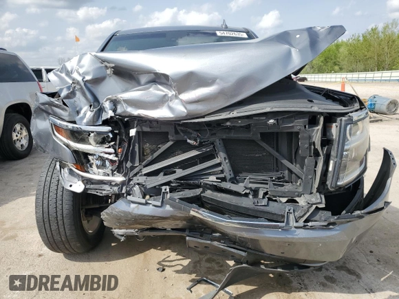 2020 Chevrolet Tahoe Premier with VIN 1GNSKCKC7LR125399, listed as a Copart auction lot 54702635 with 134,684 mi miles and Salvage title. Bid and sale history available at DreamBid. Image 5.