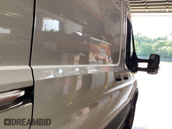2022 Ford Transit Cargo с VIN 1FTBR1CG6NKA06474, выставлен на аукционе IAAI как лот 42521100 с пробегом 82 772 миль миль и . История ставок и продаж доступна на DreamBid. Изображение 20.