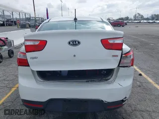 2012 Kia Rio LX with VIN KNADM4A31C6089842, listed as a IAAI auction lot 41928559 with 129,030 mi miles. Bid and sale history available at carsss.com. Image 6.