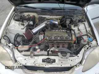 1997 Honda Civic DX z VIN JHMEJ6525VS009951, wystawiony jako Copart lot #60757545 z przebiegiem 205 070 mil mil oraz Czysty tytuł • Clean title. Historia ofert i sprzedaży dostępna na DreamBid. Obrazek 11.