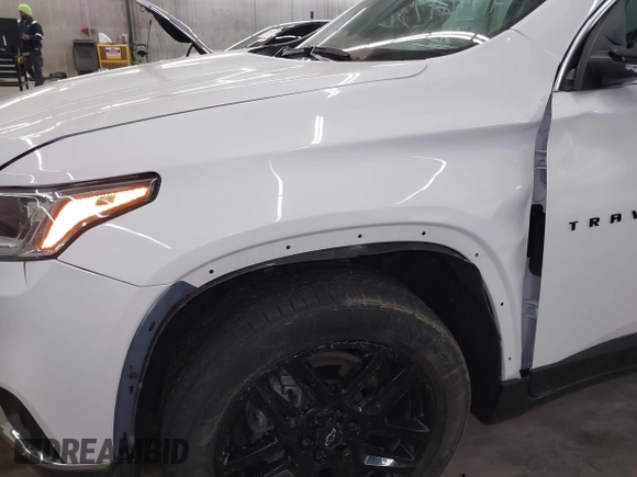 2021 Chevrolet Traverse LT Cloth with VIN 1GNERGKW1MJ206196, listed as a IAAI auction lot 41946973 with 70,630 mi miles. Bid and sale history available at carsss.com. Image 6.