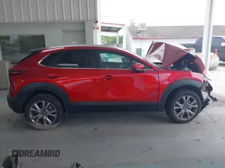 2023 Mazda CX-30 S Carbon Edition with VIN 3MVDMBCM3PM537841, listed as a IAAI auction lot 42080487 with 22,718 mi miles and . Bid and sale history available at DreamBid. Image 14.