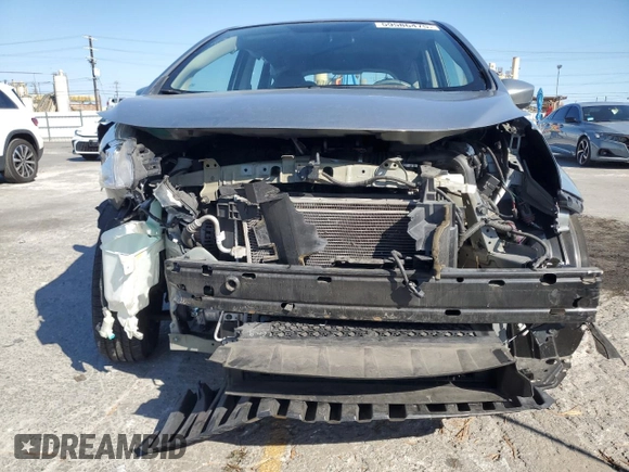 2015 Nissan Note S with VIN 3N1CE2CP4FL358297, listed as a Copart auction lot 59586475 with 53,252 mi miles and Salvage title. Bid and sale history available at DreamBid. Image 5.