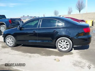 2012 Volkswagen Jetta Sedan SE w/Convenience with VIN 3VWDX7AJ4CM419447, listed as a IAAI auction lot 41653205 with 101,647 mi miles. Bid and sale history available at carsss.com. Image 14.