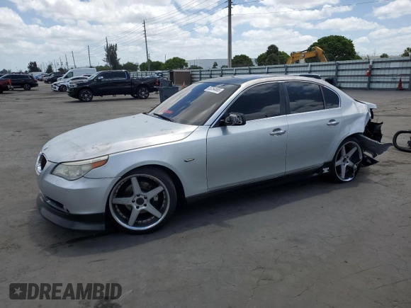 2005 BMW 5 Series 530i with VIN WBANA73505CR59646, listed as a Copart auction lot 55264865 with 187,911 mi miles and Salvage title. Bid and sale history available at DreamBid. Image 1.