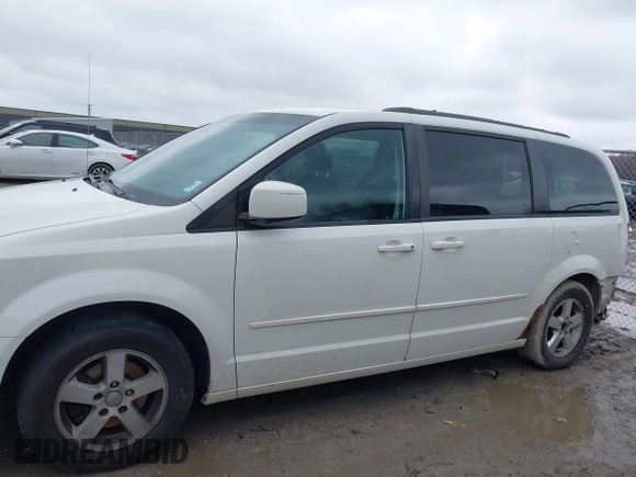 2012 Dodge Grand Caravan SXT with VIN 2C4RDGCG8CR294836, listed as a IAAI auction lot 41995385 with 184,475 mi miles and . Bid and sale history available at DreamBid. Image 13.