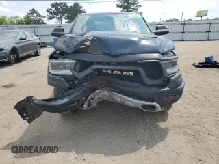 2019 Ram 1500 Rebel z VIN 1C6SRFLT8KN618140, wystawiony jako Copart lot #54734815 z przebiegiem 145 040 mil mil oraz Szkoda całkowita • Salvage title. Historia ofert i sprzedaży dostępna na DreamBid. Obrazek 5.
