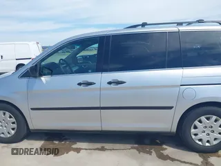 2010 Honda Odyssey LX z VIN 5FNRL3H29AB016884, wystawiony jako IAAI lot #41652673 z przebiegiem 162 068 mil mil oraz . Historia ofert i sprzedaży dostępna na DreamBid. Obrazek 15.