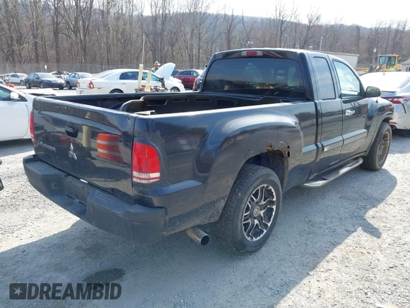 2006 Mitsubishi Raider LS with VIN 1Z7HC22K56S561574, listed as a IAAI auction lot 41757412 with 216,559 mi miles. Bid and sale history available at carsss.com. Image 4.