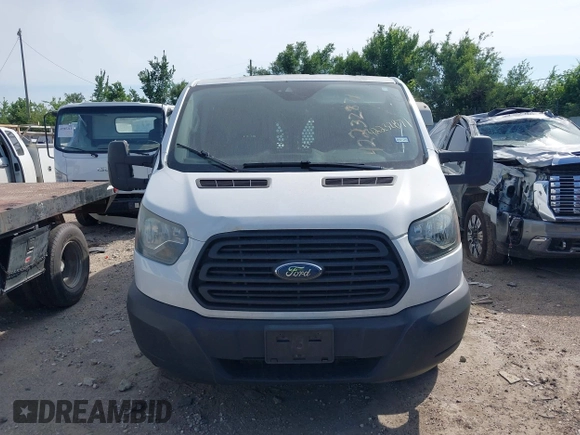 2016 Ford Transit Cargo with VIN 1FTYE1ZM0GKB06687, listed as a IAAI auction lot 42232871 with 330,423 mi miles and . Bid and sale history available at DreamBid. Image 12.