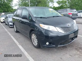 2012 Toyota Sienna XLE AAS with VIN 5TDYK3DC3CS255214, listed as a IAAI auction lot 42390803 with 113,425 mi miles and . Bid and sale history available at DreamBid. Image 1.
