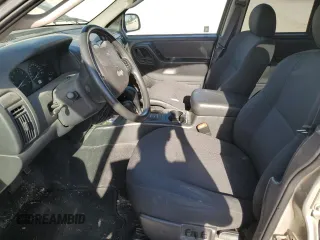 2004 Jeep Grand Cherokee Laredo with VIN 1J4GW48S34C307347, listed as a Copart auction lot 55749565 with Not provided miles and Salvage title. Bid and sale history available at DreamBid. Image 7.