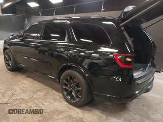 2023 Dodge Durango R/T Plus with VIN 1C4SDJCT8PC571642, listed as a IAAI auction lot 42093743 with 33,631 mi miles and . Bid and sale history available at DreamBid. Image 3.