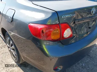 2010 Toyota Corolla with VIN 1NXBU4EE0AZ305870, listed as a IAAI auction lot 42228971 with 208,644 mi miles and . Bid and sale history available at DreamBid. Image 14.