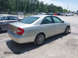 2002 Toyota Camry LE z VIN 4T1BE32K02U630523, wystawiony jako IAAI lot #42330724 z przebiegiem 138 459 mil mil oraz . Historia ofert i sprzedaży dostępna na DreamBid. Obrazek 4.