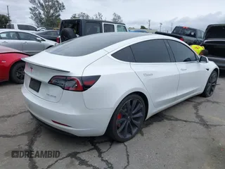 2020 Tesla Model 3 Performance z VIN 5YJ3E1EC4LF625109, wystawiony jako IAAI lot #41735149 z przebiegiem 95 010 mil mil oraz . Historia ofert i sprzedaży dostępna na DreamBid. Obrazek 4.