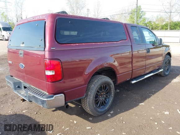 2005 Ford F-150 XLT with VIN 1FTPX12505FB69853, listed as a IAAI auction lot 42092756 with 330,699 mi miles. Bid and sale history available at carsss.com. Image 4.