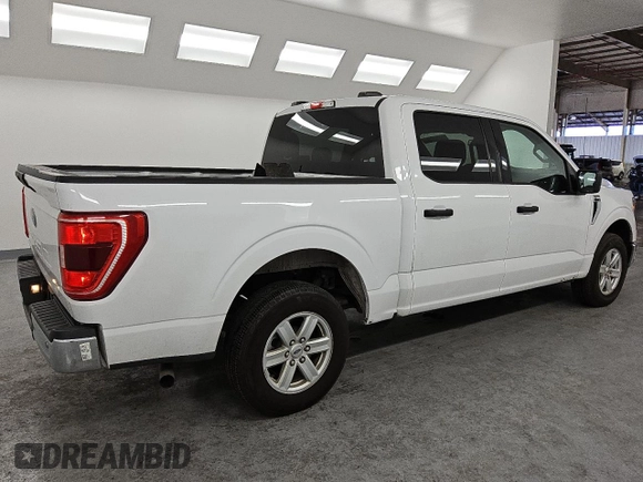2023 Ford F-150 XL with VIN 1FTEW1CBXPKD88702, listed as a Copart auction lot 48817875 with 31,549 mi miles and Clean Title. Bid and sale history available at carsss.com. Image 3.