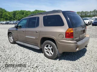 2003 GMC Envoy SLT with VIN 1GKET16S136235010, listed as a Copart auction lot 57380734 with 161,818 mi miles and Salvage Title. Bid and sale history available at DreamBid. Image 2.