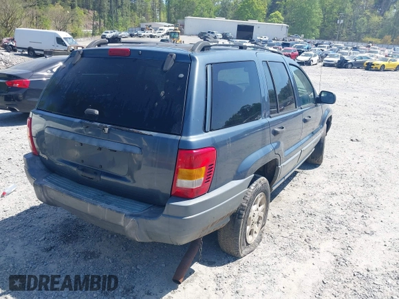 2000 Jeep Grand Cherokee Laredo with VIN 1J4G248S1YC416634, listed as a IAAI auction lot 42036197 with 140,596 mi miles and . Bid and sale history available at DreamBid. Image 4.