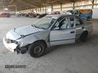 2000 Toyota Corolla VE with VIN 1NXBR12E3YZ313086, listed as a Copart auction lot 64883245 with 104,882 mi miles and Clean title. Bid and sale history available at DreamBid. Image 1.