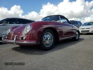 1967 Volkswagen Beetle with VIN 157343436, listed as a Copart auction lot 77122704 with 1,328 mi miles and Salvage Title. Bid and sale history available at DreamBid. Image 1.