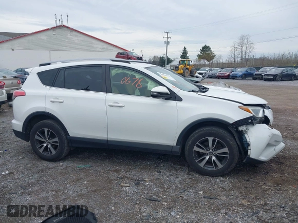 2018 Toyota RAV4 XLE with VIN JTMRFREV8JJ225065, listed as a IAAI auction lot 41940678 with 145,074 mi miles. Bid and sale history available at carsss.com. Image 13.