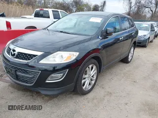 2012 Mazda CX-9 Grand Touring with VIN JM3TB3DV2C0335030, listed as a IAAI auction lot 41909217 with 126,714 mi miles. Bid and sale history available at carsss.com. Image 2.