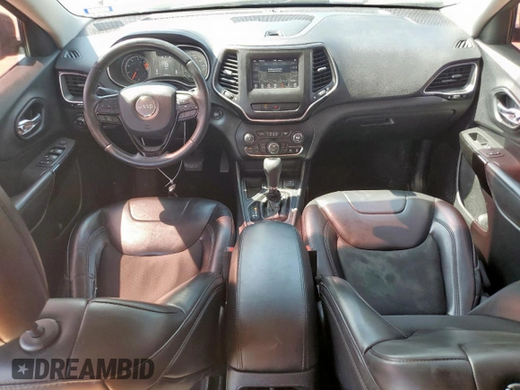 2019 Jeep Cherokee Altitude with VIN 1C4PJLLB8KD448427, listed as a Copart auction lot 58101445 with 173,007 mi miles and Salvage title. Bid and sale history available at DreamBid. Image 8.