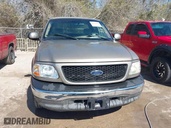 2002 Ford F-150 XL with VIN 1FTRX17242NA02789, listed as a IAAI auction lot 41832186 with 262,253 mi miles. Bid and sale history available at carsss.com. Image 12.