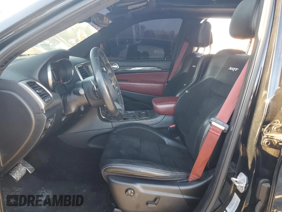 2017 Jeep Grand Cherokee SRT with VIN 1C4RJFDJ6HC828848, listed as a Copart auction lot 75535903 with 106,870 mi miles and Salvage Title. Bid and sale history available at carsss.com. Image 7.