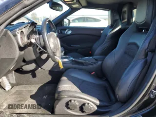 2014 Nissan 370Z Touring with VIN JN1AZ4FH3EM620195, listed as a Copart auction lot 83207104 with 66,974 mi miles and Salvage Title. Bid and sale history available at DreamBid. Image 7.
