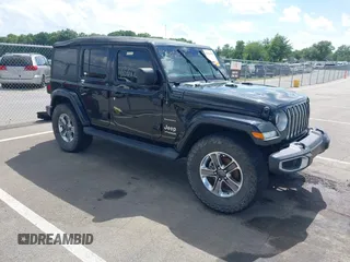 2020 Jeep Wrangler Unlimited Sahara with VIN 1C4HJXEN1LW167689, listed as a IAAI auction lot 42562104 with 58,828 mi miles and . Bid and sale history available at DreamBid. Image 1.